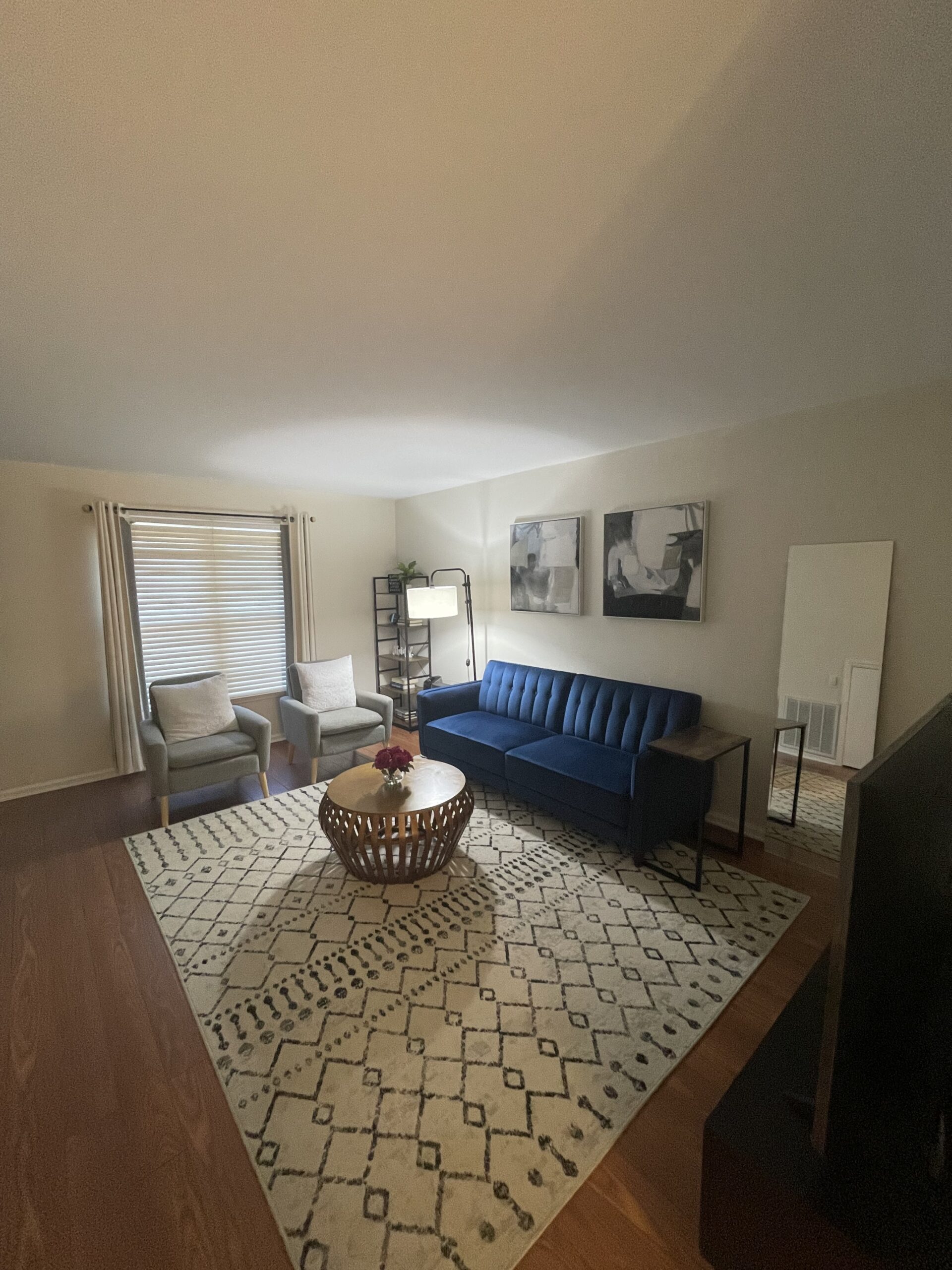 Pristine living room in an Airbnb, freshly cleaned and perfectly staged for guest arrival.